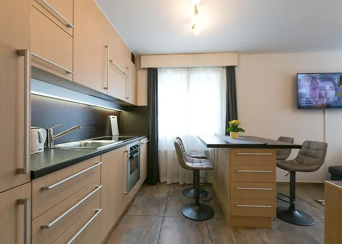 Spirit - 2 - Kueche - Parkplatz * Engelberg